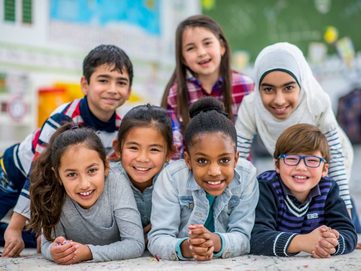 Diverse group of students posing for photo outside school for article Galena Park ISD