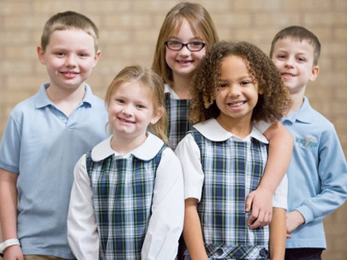 5 students in school uniforms posing for photo for article Salem Lutheran School