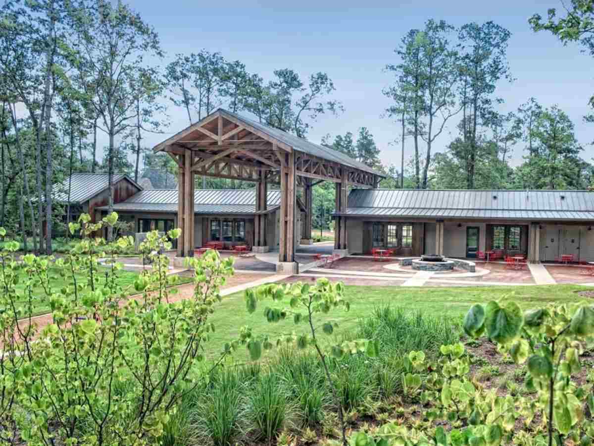 The Lifestyle Center features a gathering room, exercise room, fire-pit, playground, splash pad and great lawn for article Discover The Groves in Humble, Texas for newcomers moving to Houston or moving within Houston.