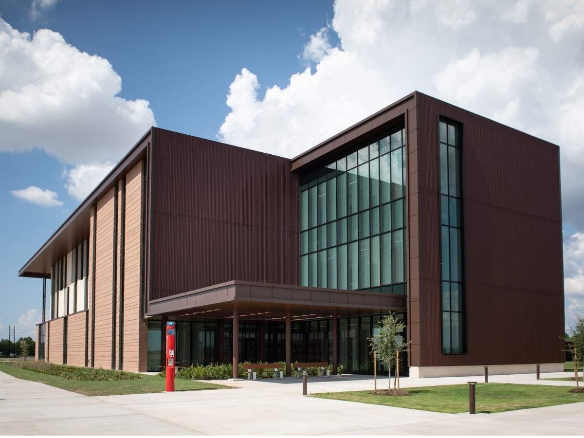 Brown modern building with long rectangular windows for article University of Houston-Victoria at Katy