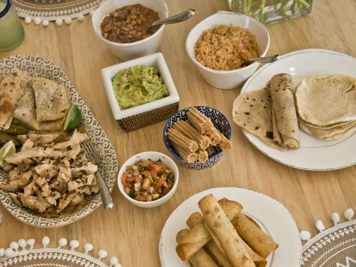 Spread of Fajitas, dips, wraps for article Fajita Pete's - Fresh Fajita's Catered and Delivered