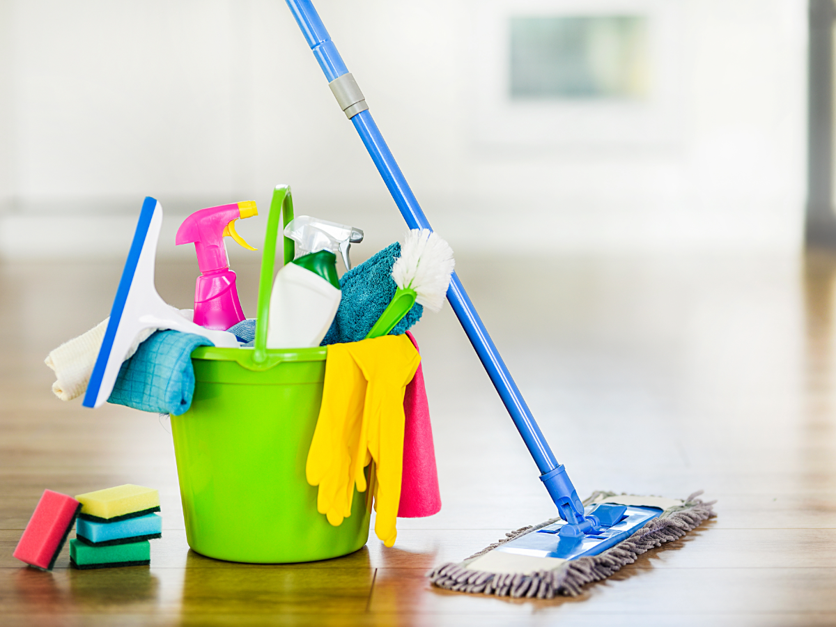 Bucket of cleaning supplies.