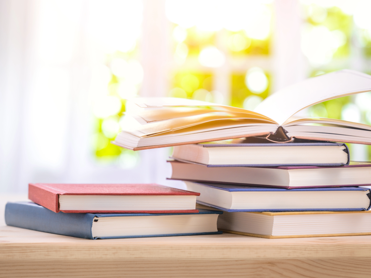 Stack of books on a table.