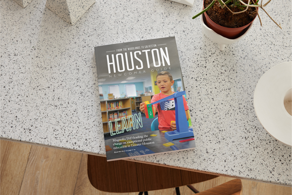 Houston Relocation Guide book on a table