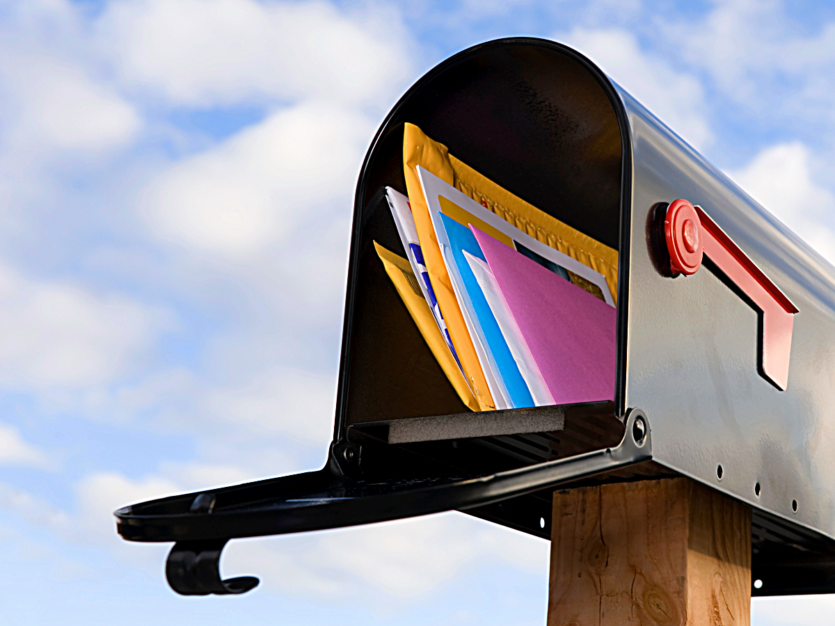 Open mailbox with letters in it.