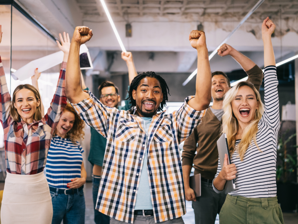 Coworkers cheering.