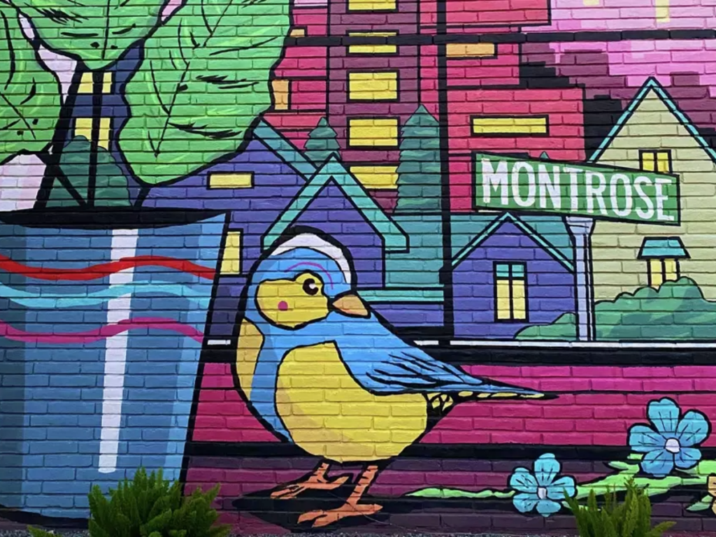 Mural on a brick wall in Montrose showing a potted pland with a little yellow and blue bird and city background with montrose painted on street sign for article Discovering the Most Unique Neighborhood in Houston for newcomers moving to Houston.