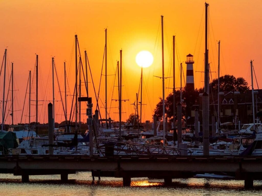 Sailboats docked at sunset for article Living in League City, Texas for newcomers moving to League City in the Houston area.