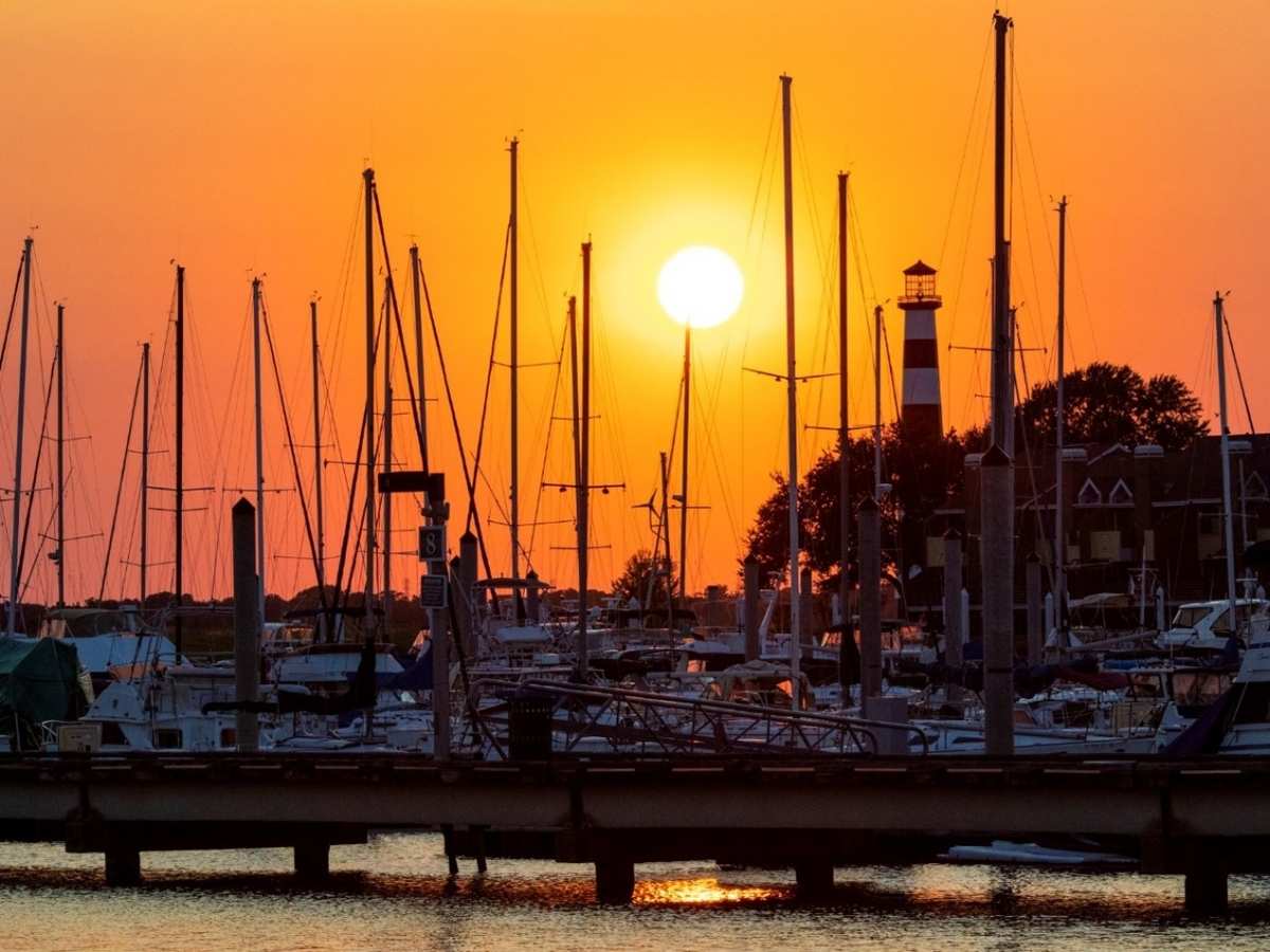 Sailboats docked at sunset for article Living in League City, Texas for newcomers moving to League City in the Houston area.